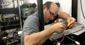 John repairing repeater